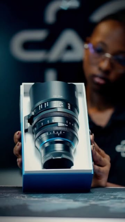 A cine lens coming out of the box at the Camera Hub counter